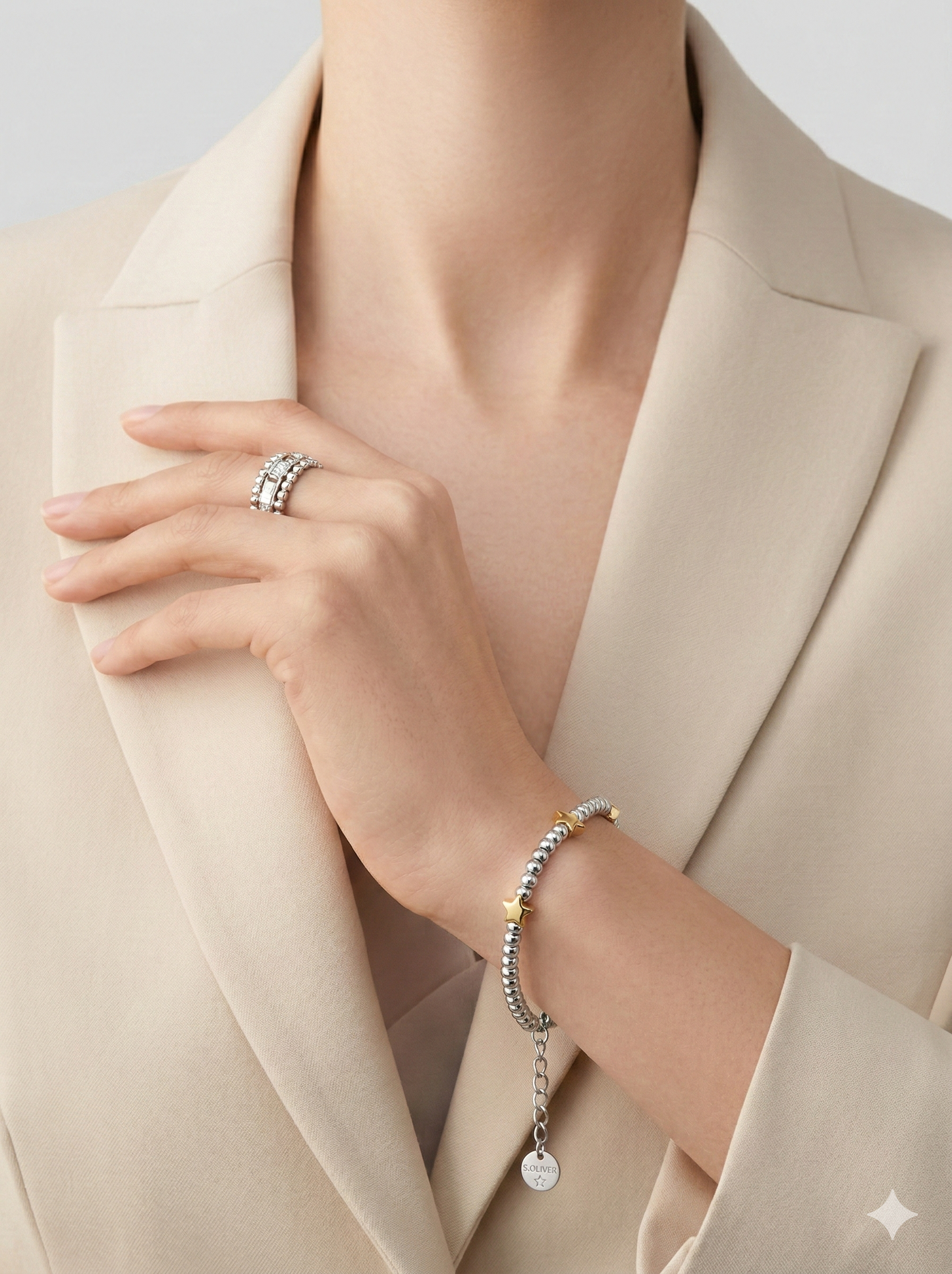 Pulsera con diseño de estrellas, bicolor dorado y plateado