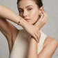 Brazalete mesh dorado con terminales de corazón