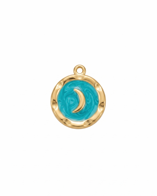 Dije de medalla dorada lunar con tonos turquesa