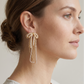 Aretes Colgantes de Moño con Flecos de Cristal