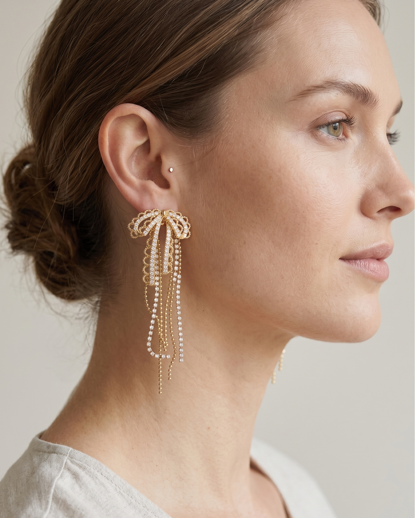Aretes Colgantes de Moño con Flecos de Cristal