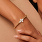 Pulsera dorada con diseño de cruz en perla