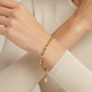 Pulsera Trenzada en Tono Dorado
