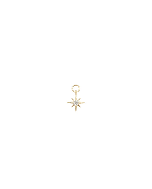 Dije de estrella del norte con cristal central en dorado