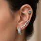 Broqueles cuadrados con cristal azul cielo y halo de micro-pavé