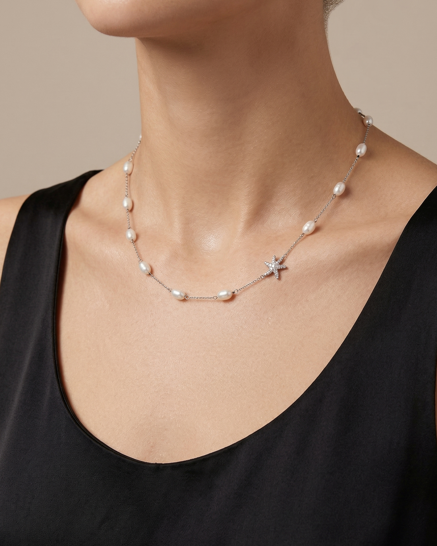 Collar de estaciones con perlas barrocas y estrella de mar