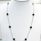 Collar de estaciones con tréboles de ónix negro