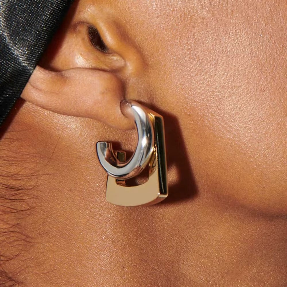 Aretes estilo studs bicolor