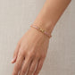 Pulsera tipo tennis con cristales marquesa en tono rosa