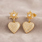 Aretes corazón radiante con sol de perla y cristales