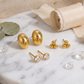 Set de aretes tipo studs con formas orgánicas y cristales