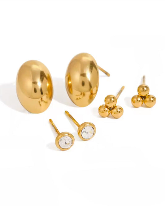 Set de aretes tipo studs con formas orgánicas y cristales