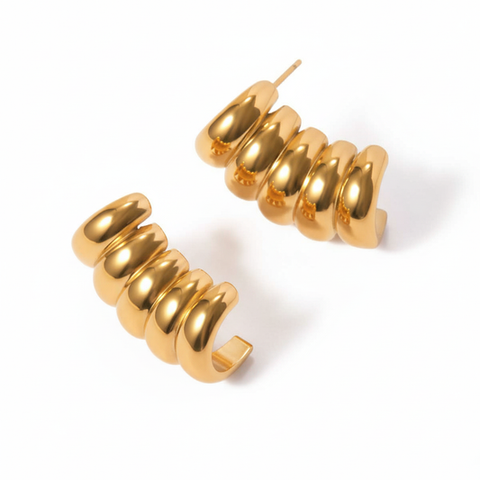 Arete statement, tipo ear cuff.