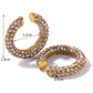 Arete elegante de piedra zirconia, tipo ear cuff.