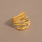 Anillo envolvente multilínea dorado