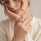 Anillo triple con circonia marquesa y textura torzal