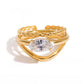 Anillo triple con circonia marquesa y textura torzal