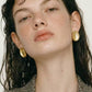 Aretes Plateados Ovalados con Textura de Ola