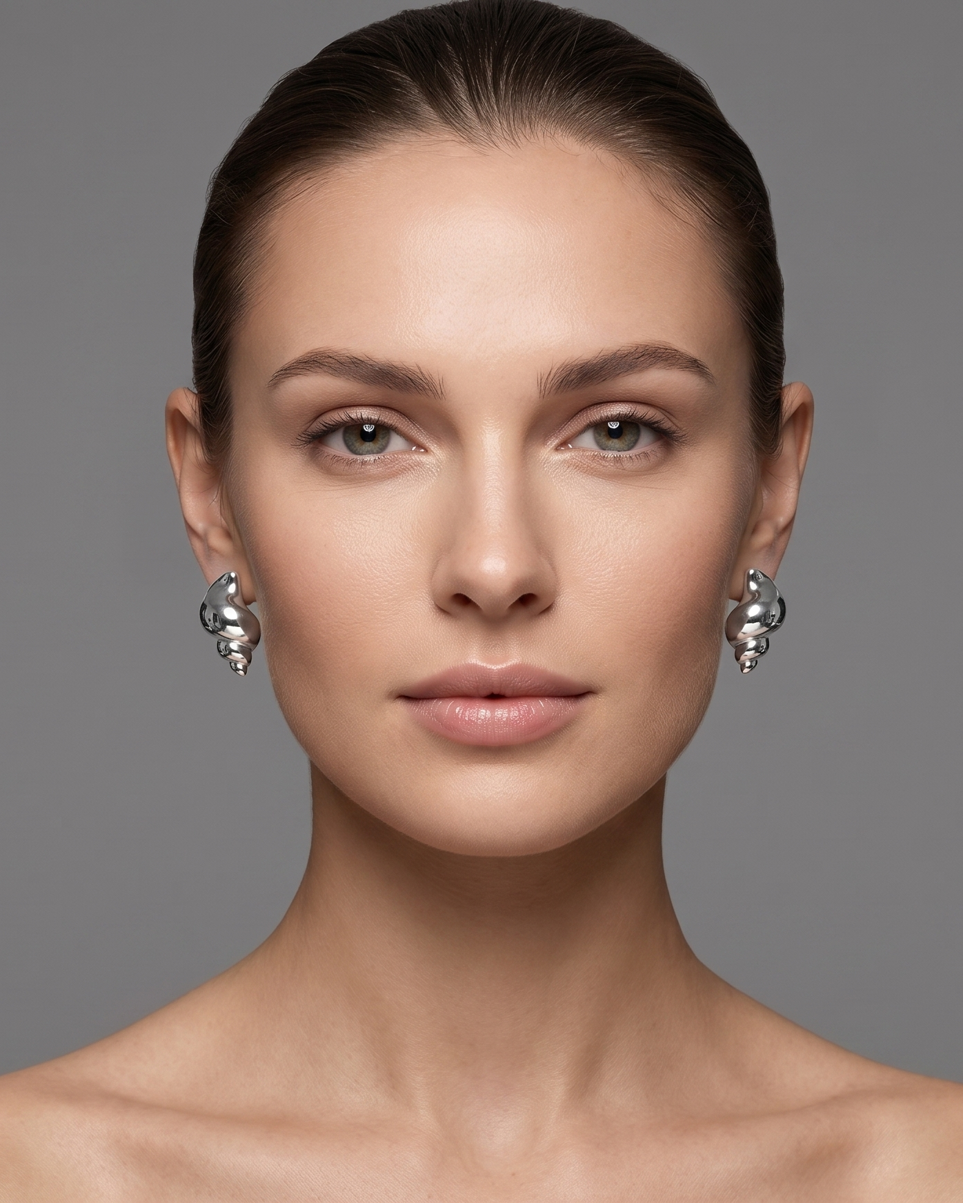 Aretes Caracola Plateada