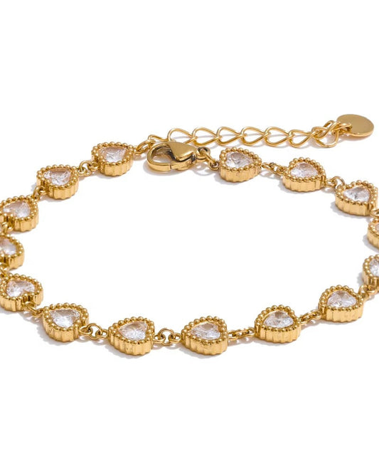 Pulsera con diseño de corazon, color dorado