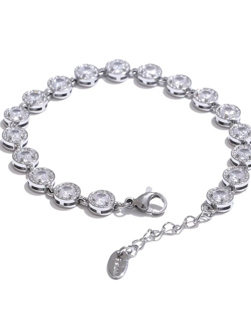 Pulsera con zirconias, color plateado