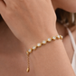 Pulsera con zirconias blancas, color dorado
