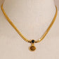 Collar con piedra ojo de tigre, color dorado