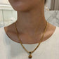Collar con piedra ojo de tigre, color dorado