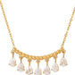 Collar largo dorado con piedras brillantes colgantes