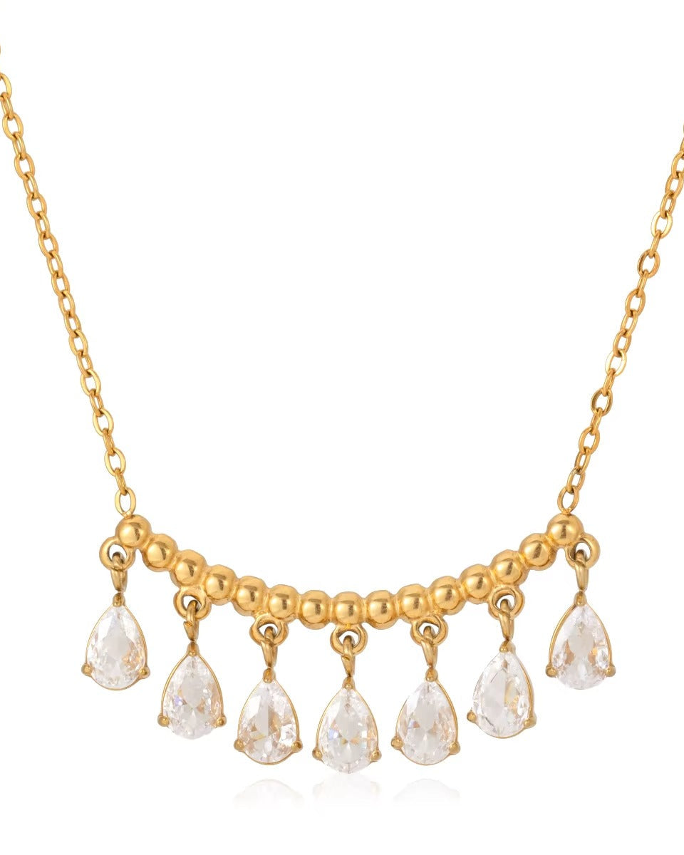 Collar largo dorado con piedras brillantes colgantes
