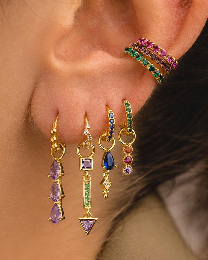 Arete statement de flores con piedras en color rosa, de tipo drop
