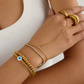 Pulsera dorada de ojo turco azul