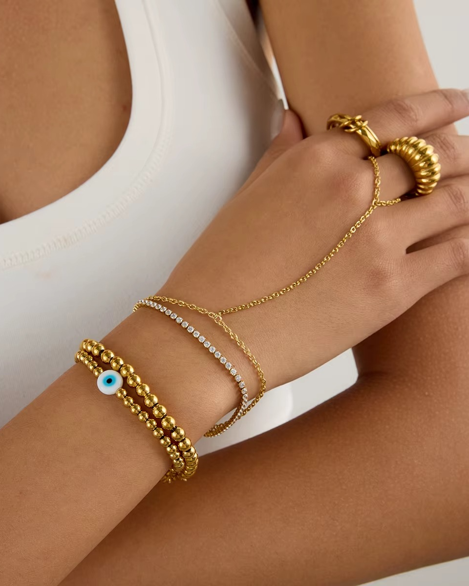 Pulsera dorada de ojo turco azul