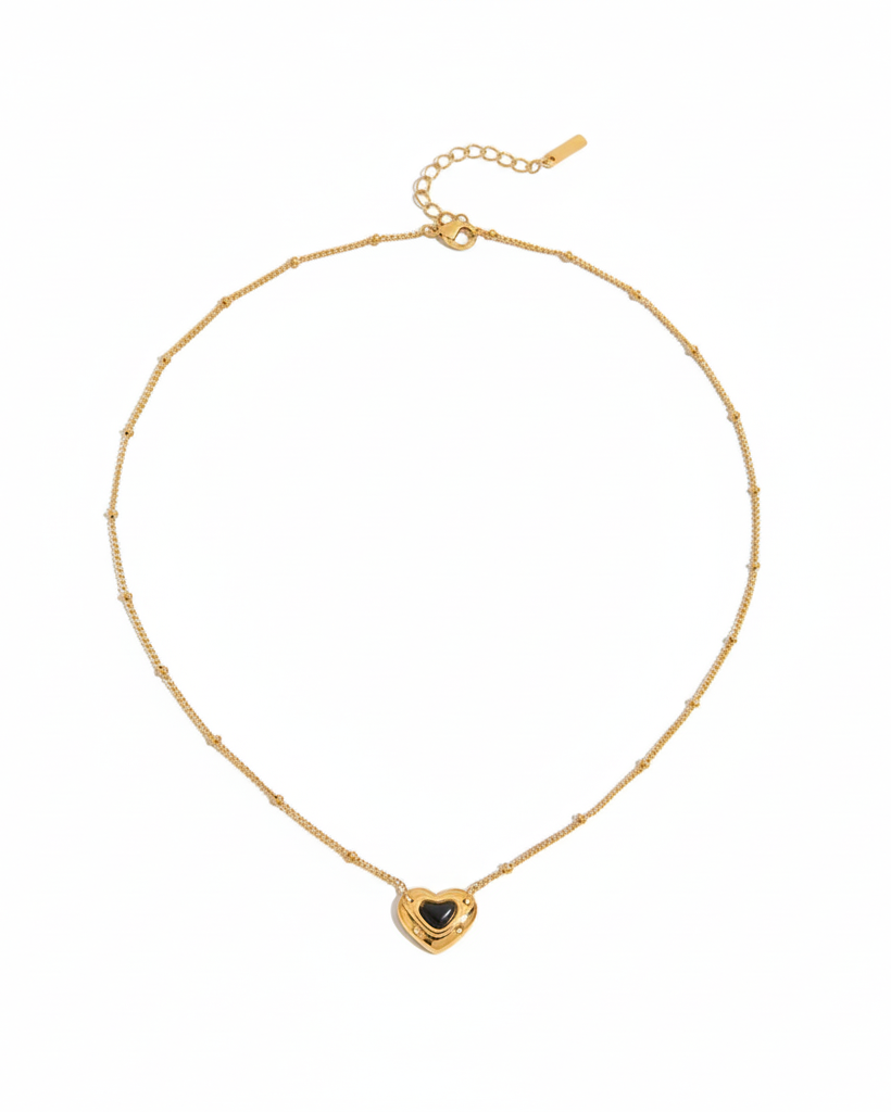 Collar dorado de corazón en color negro de tipo ajustable