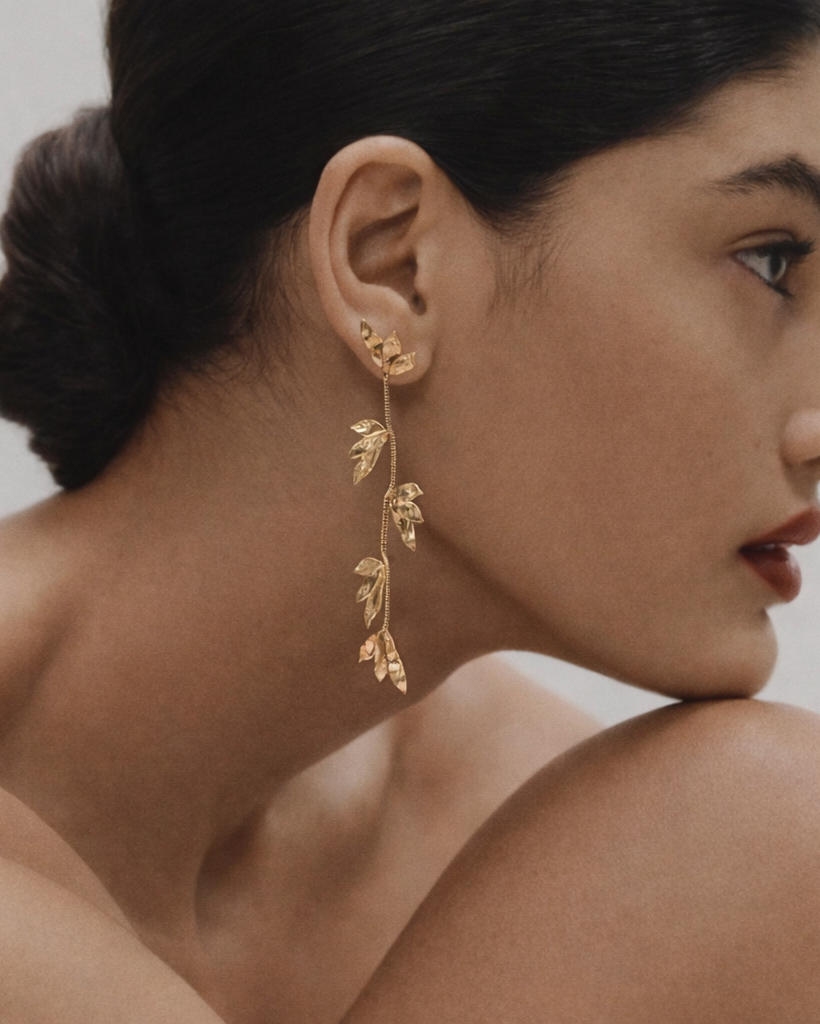 Aretes de hojas colgantes dorado en acero inoxidable
